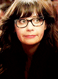Jess from New Girl with large glasses
