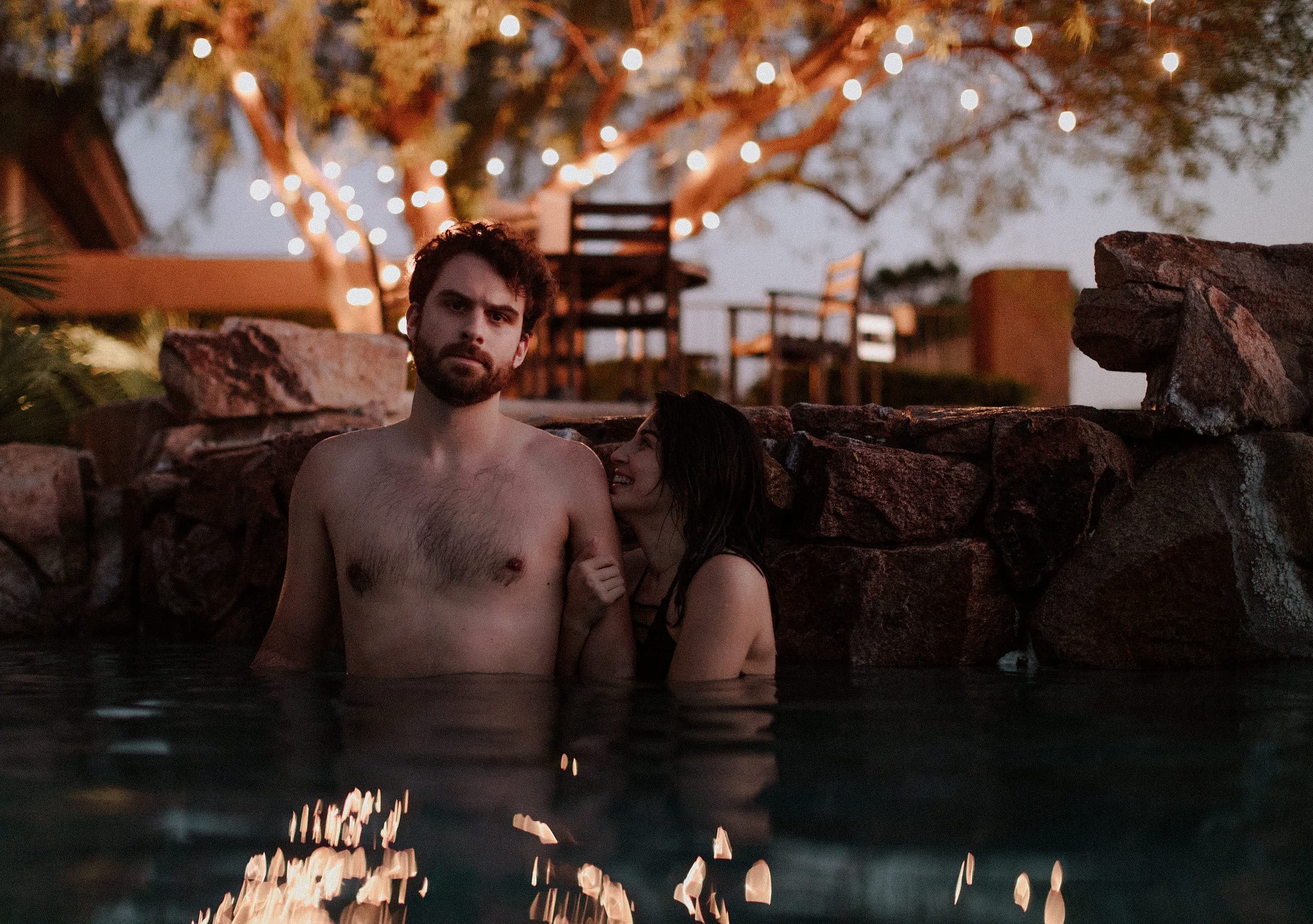 Moody Las Vegas couples session in the pool at sunset