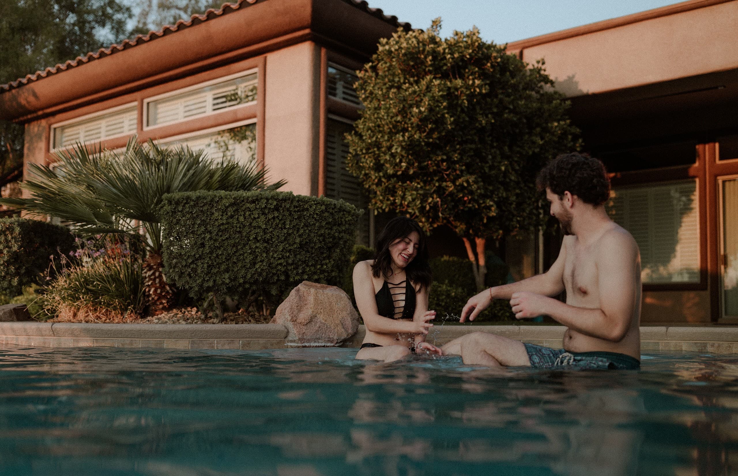 Cute engagement photos in pool by Las Vegas elopement photographer