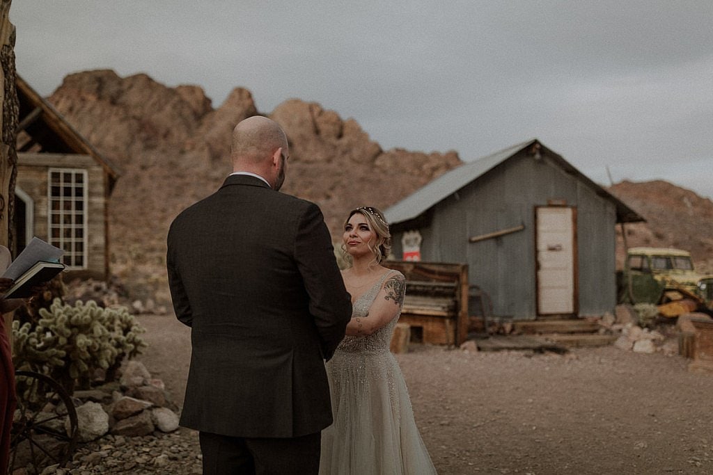 Bride gets emotional during her Las Vegas elopement ceremony at rustic wedding venue
