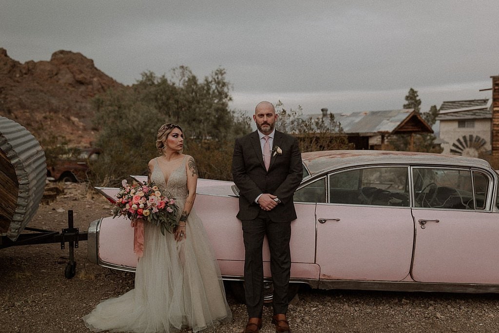 El Dorado Ghost Town Elopement Las Vegas at Sunset with spring flowers and pink cadillac