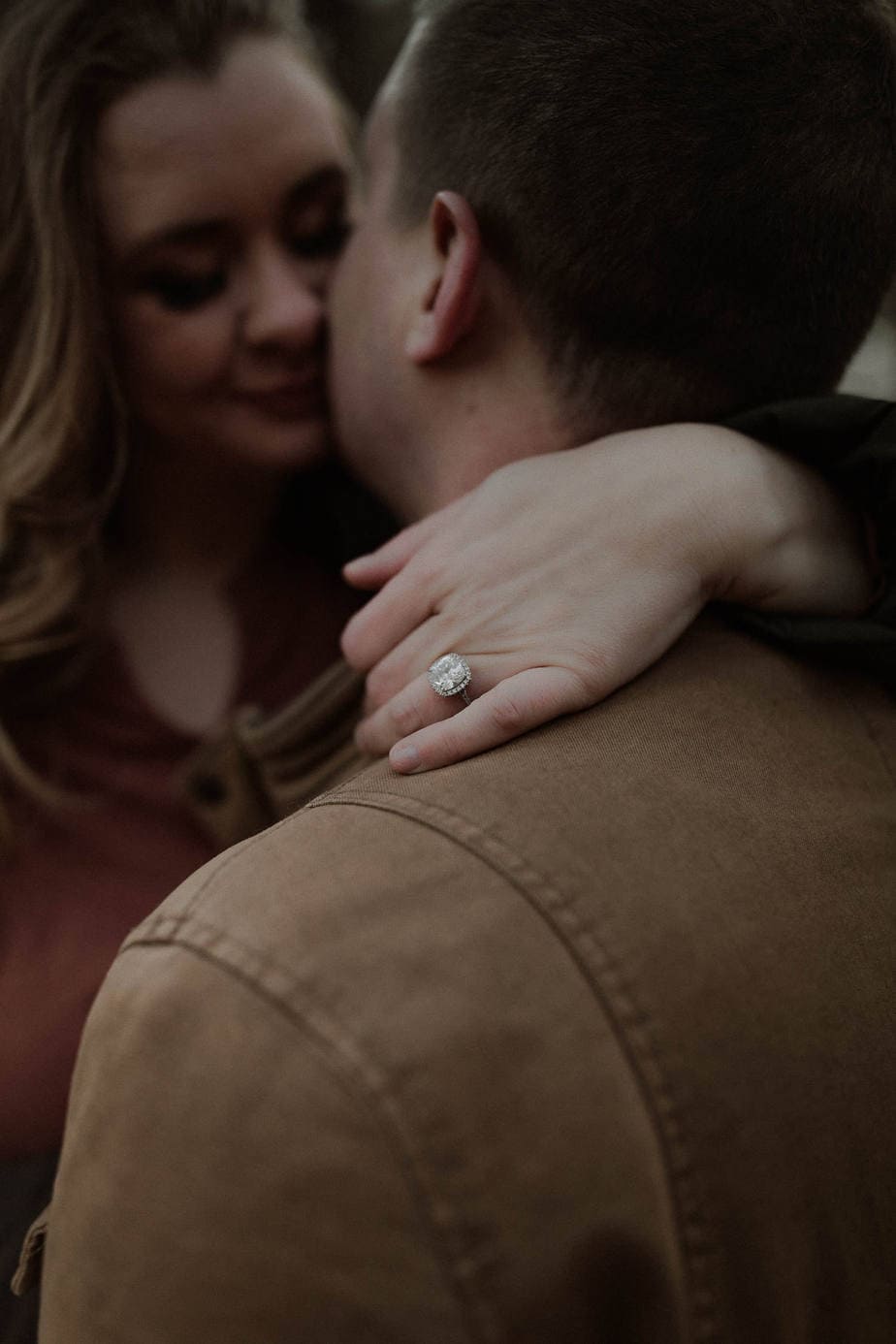 Close up image of gorgeous engagement ring during winter engagement session
