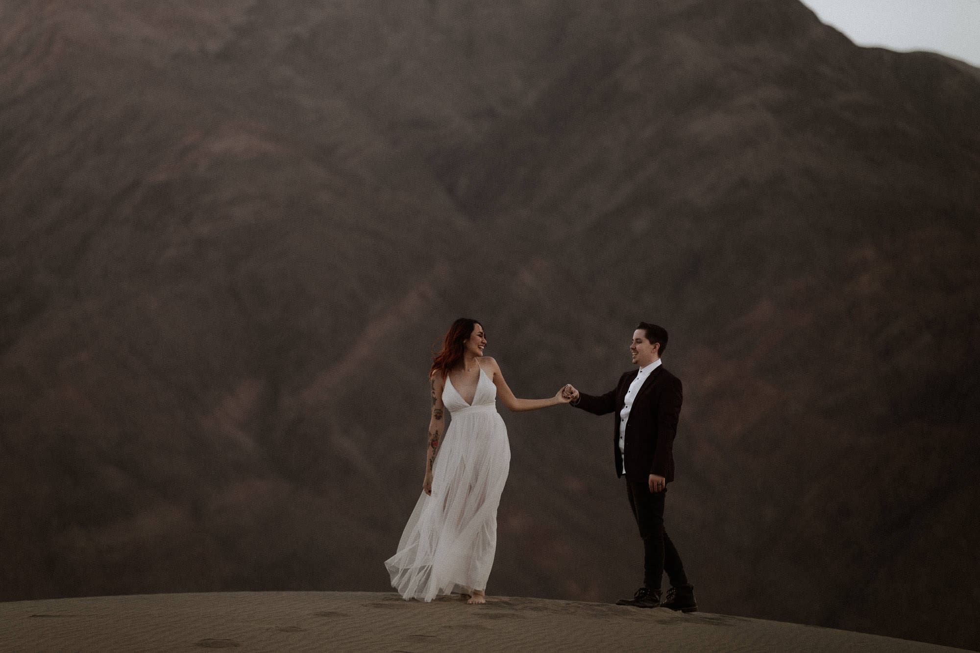 Adventure elopement in Mesquite Valley Sand Dunes at sunset