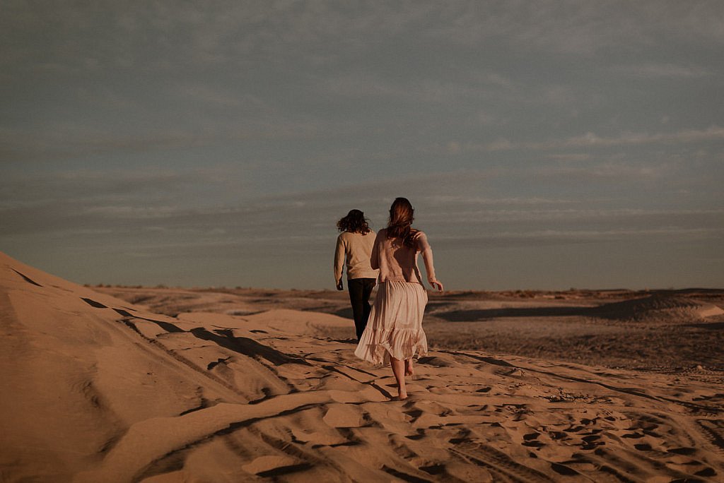 Fun adventure couples session in the sand dunes