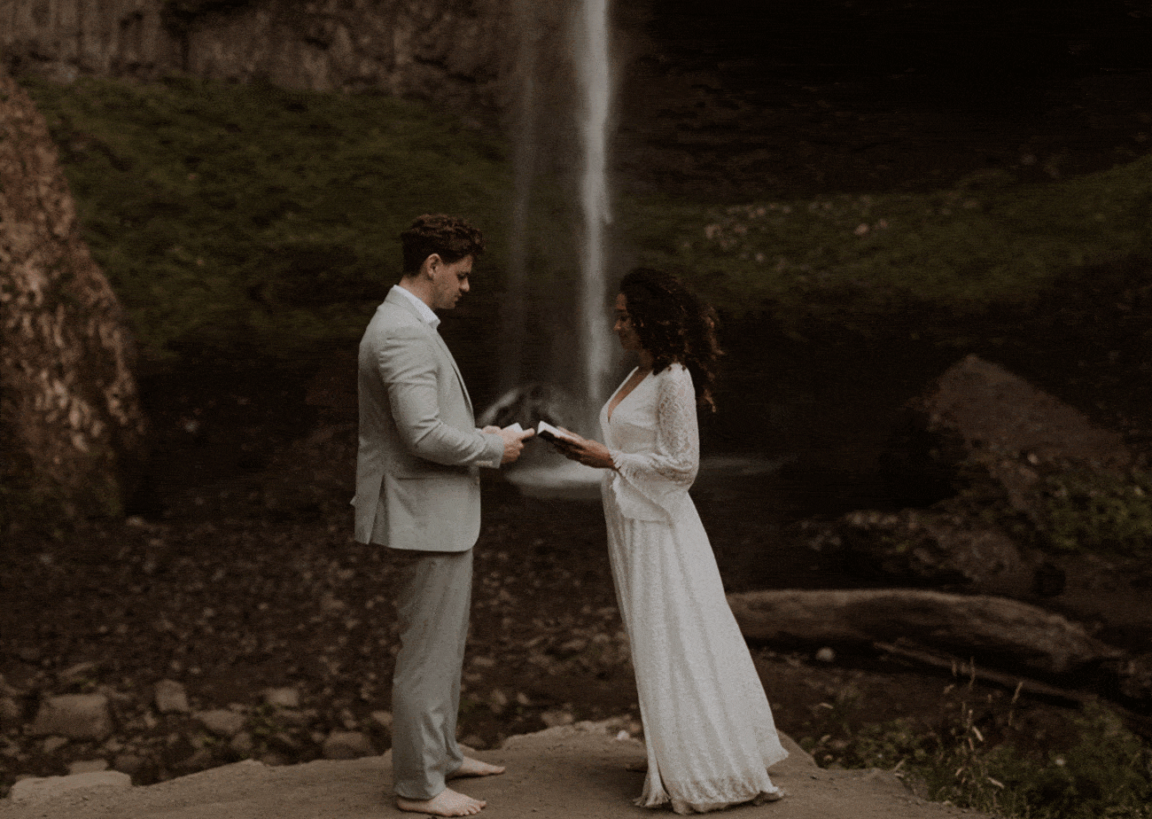 GIF of wedding couple saying their intimate vows in front of Latourell falls for their Oregon waterfall elopement