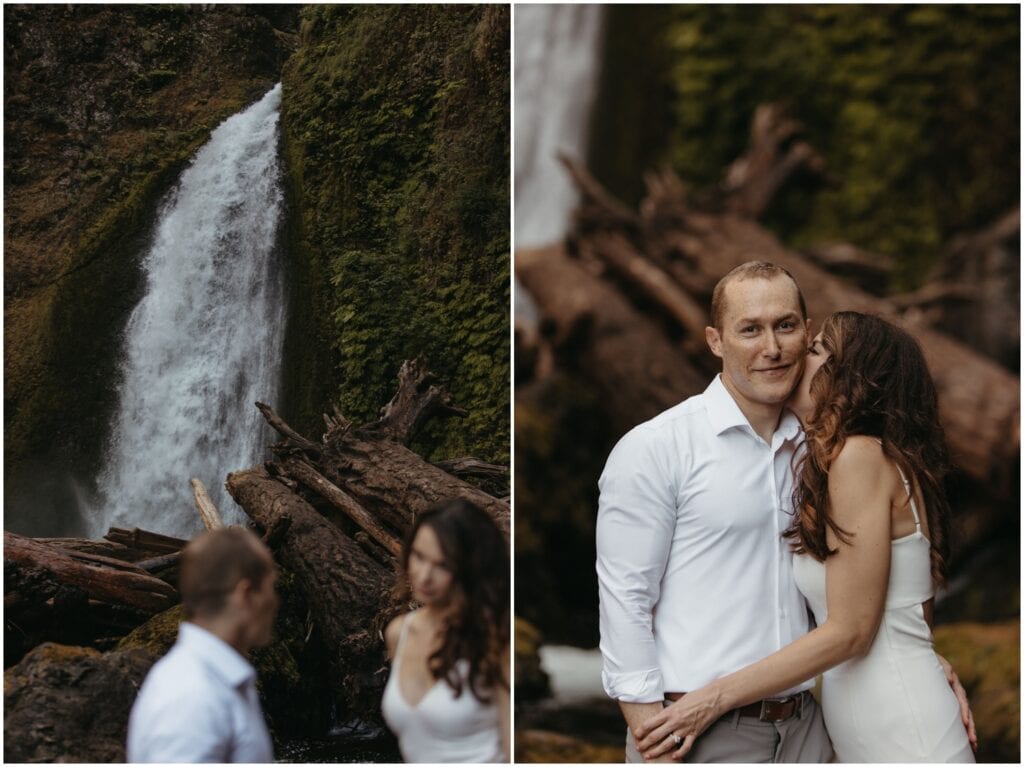 Wedding couple poses in front of large waterfall