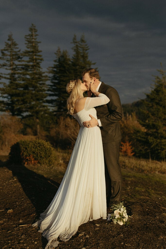 couple first kiss after Oregon elopement