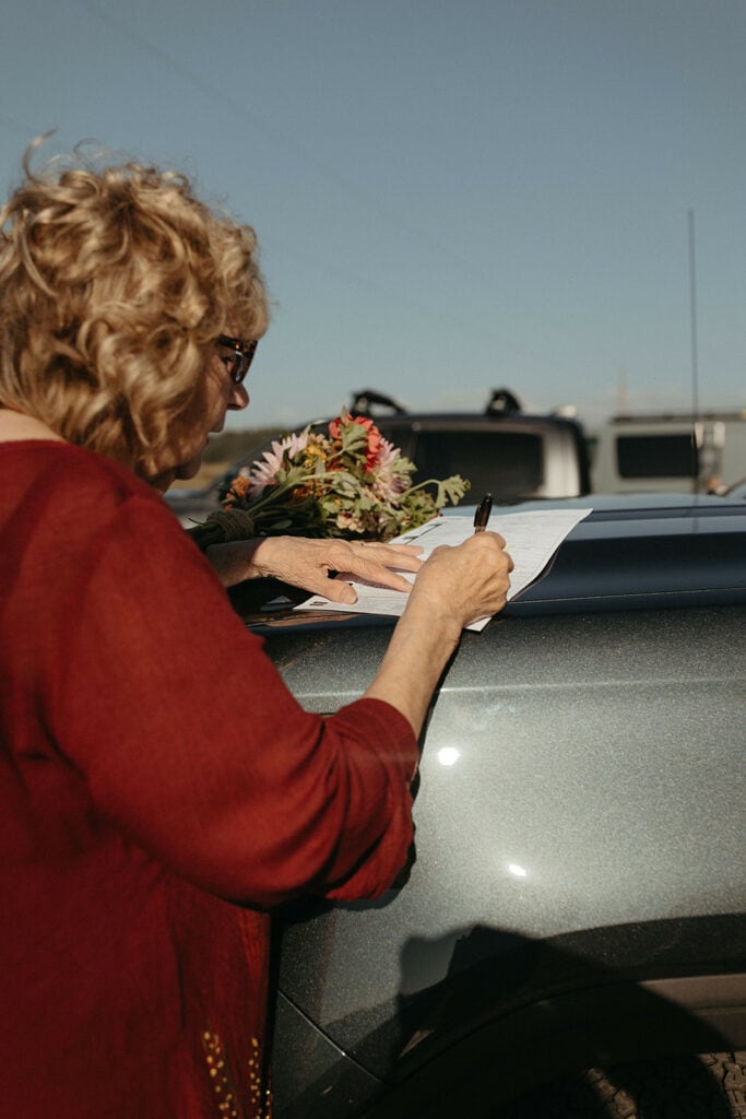 grandmother signing witness form 