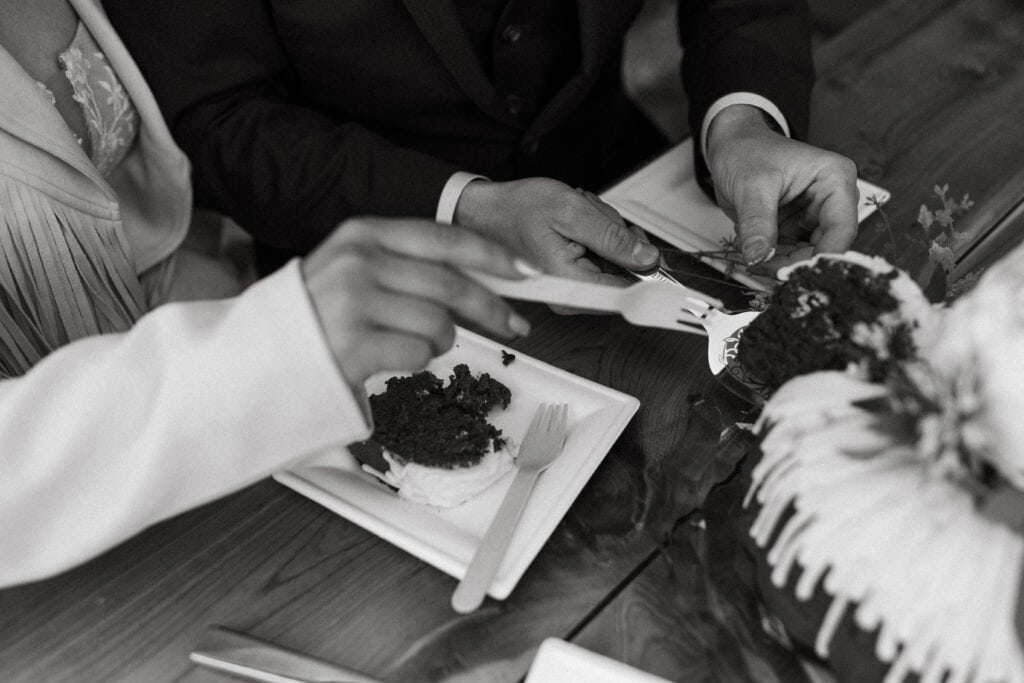 couple serving themselves a slice on bundt cake