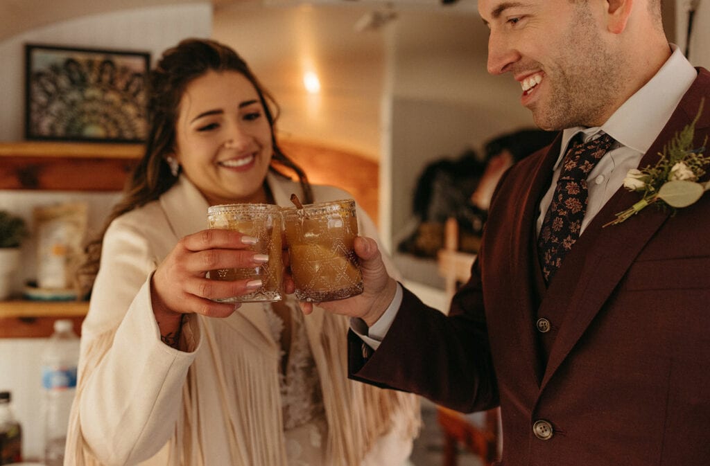 Couple having a cheers after their elopement ceremony
