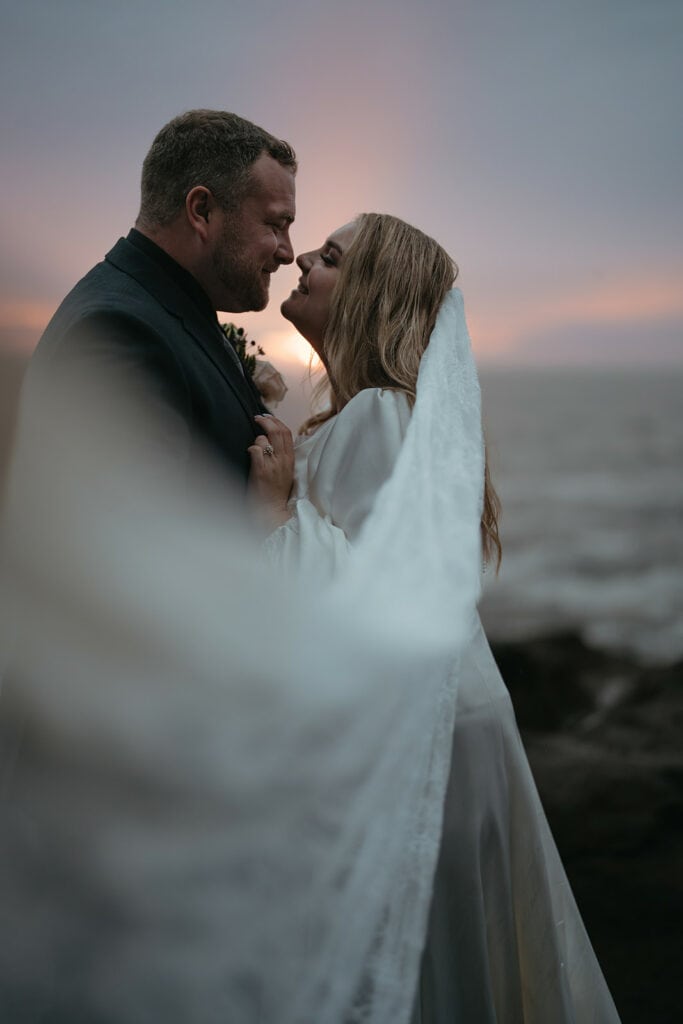 cliffside couples portraits for an elopement in Oregon at sunset