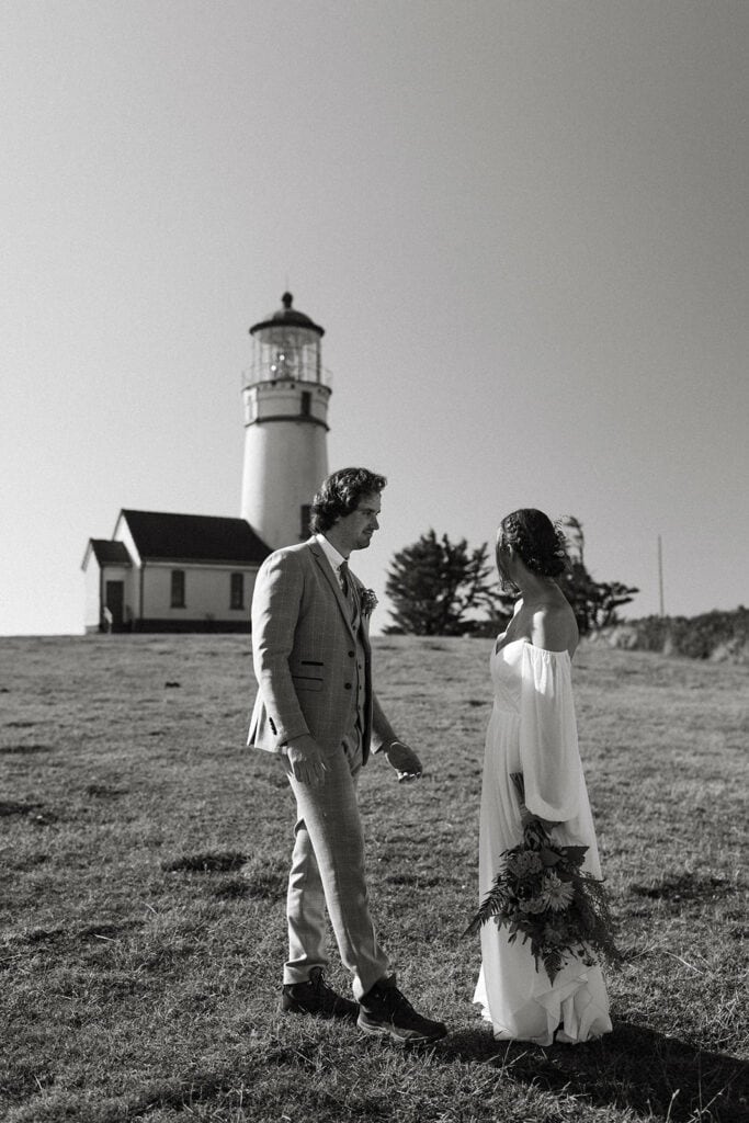 Romantic couples photos in front of the Coquille River Lighthouse in Bandon, Oregon