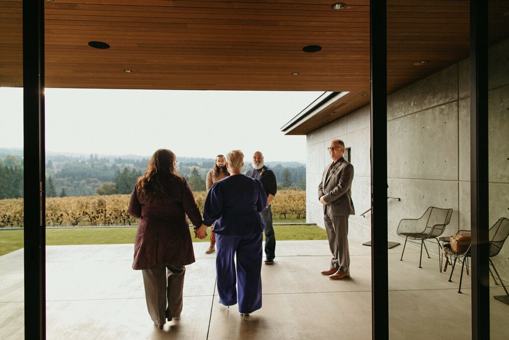 Amy walks out to her winery elopement ceremony at Ponzi Vineyards