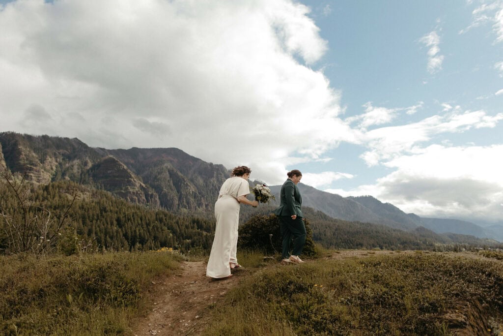 Couple hiking trails for their adventure elopement