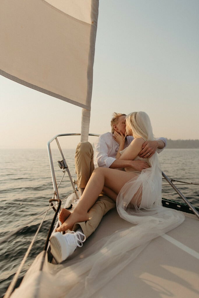 A couple chooses a Puget Sound sailboat tour for their adventure engagement photos